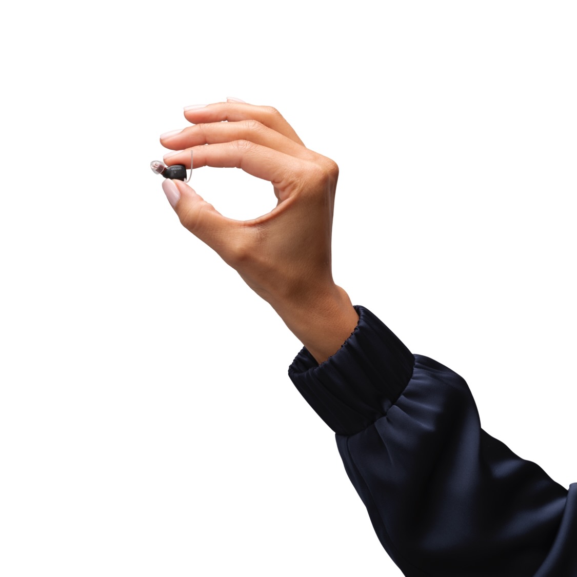Oticon Zeal hearing aid in hand showing tiny size